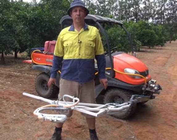 Figure 5. Single pass trunk band sprayer invented by Daniel. A video of the trunk band sprayer is on the NSW DPI citrus website. One sided trunk band sprayer